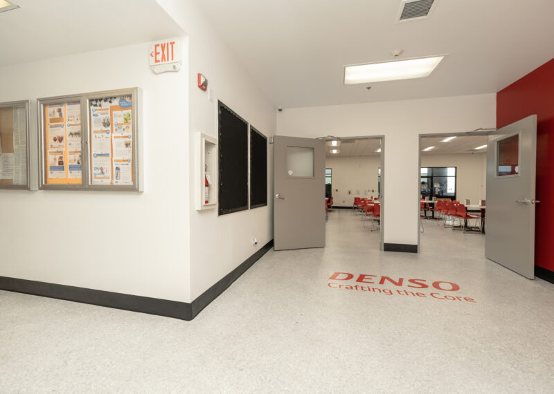 Tenant Improvements - Hallway with floor logo