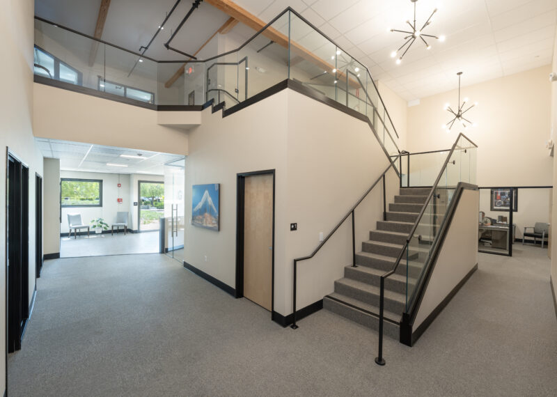 Commercial Renovation: Stairway with Glass and Metal Rails
