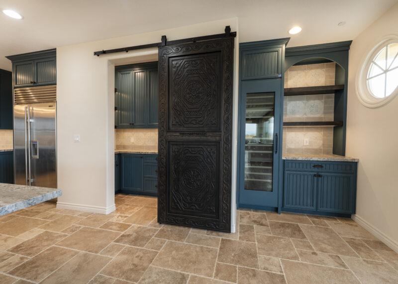 Sliding pantry door for walk in pantry in kitchen remodel