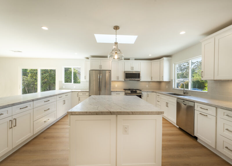 Open concept kitchen in a home remodel by Youngren Construction