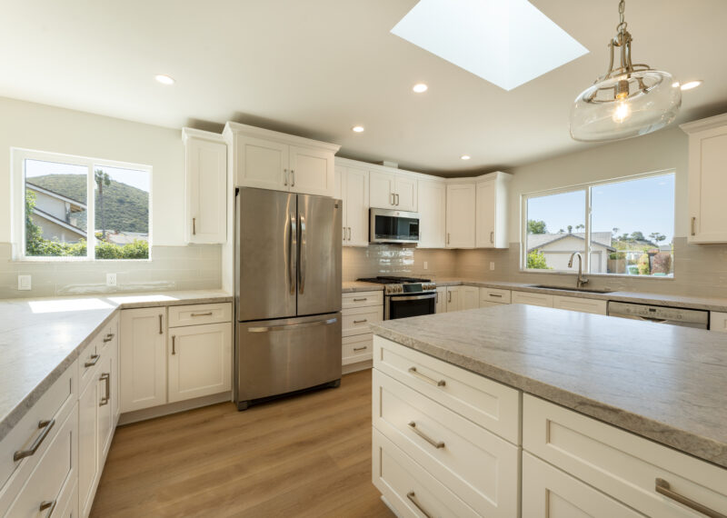 Stainless steel appliances in a 1970s home kitchen remodel