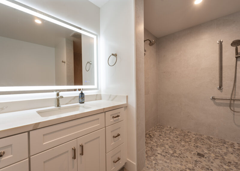 Master bathroom remodel with LED light up mirrors and walk in ADA bathroom