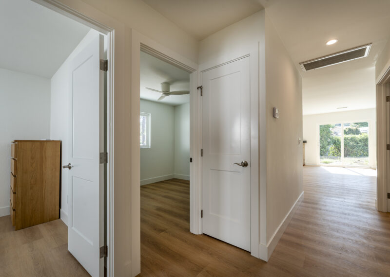 Beautiful new doors, baseboards, and trim in this home renovation