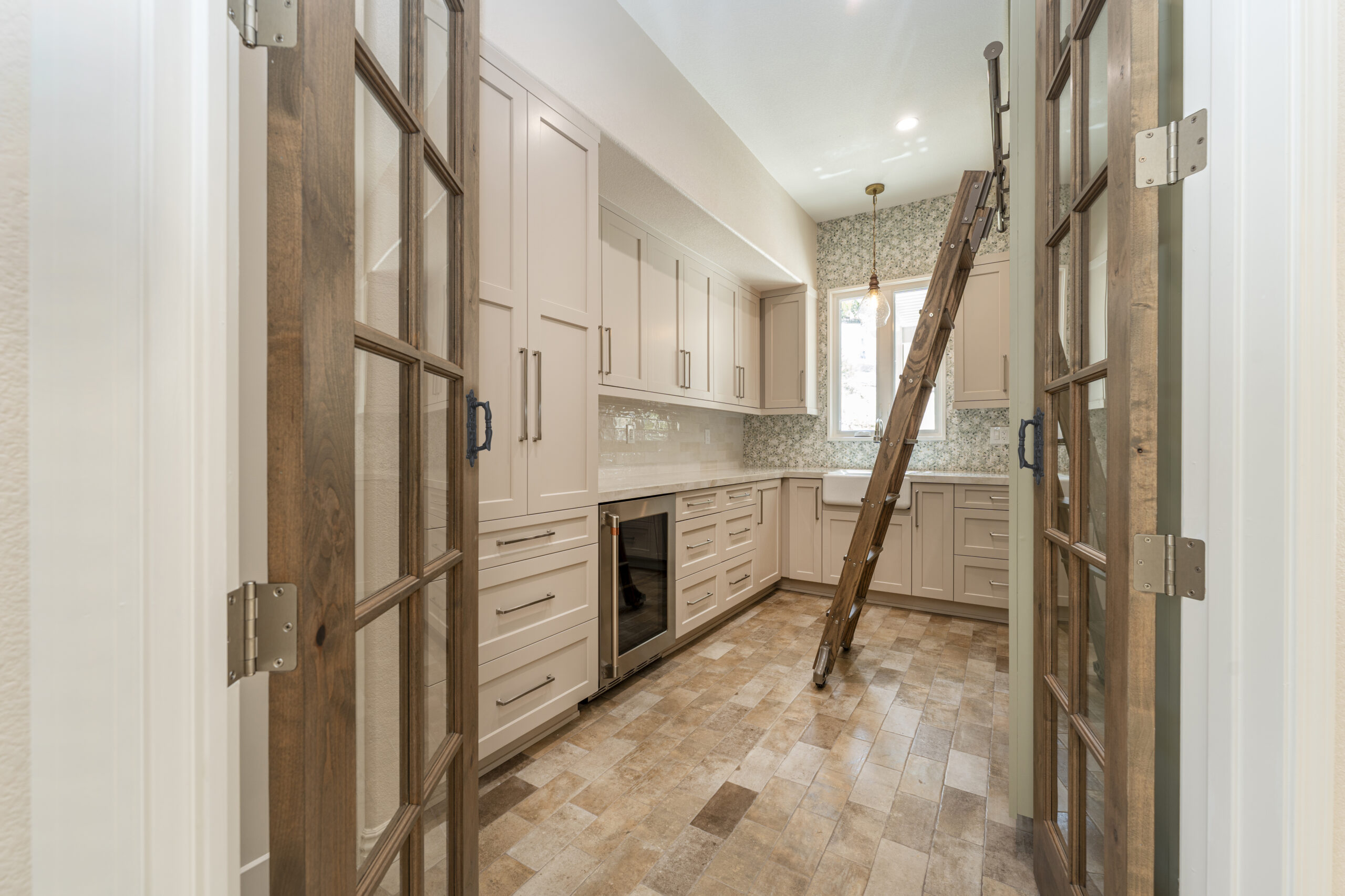 Large walk-in pantry for a full kitchen remodel by Youngren Construction in Fallbrook