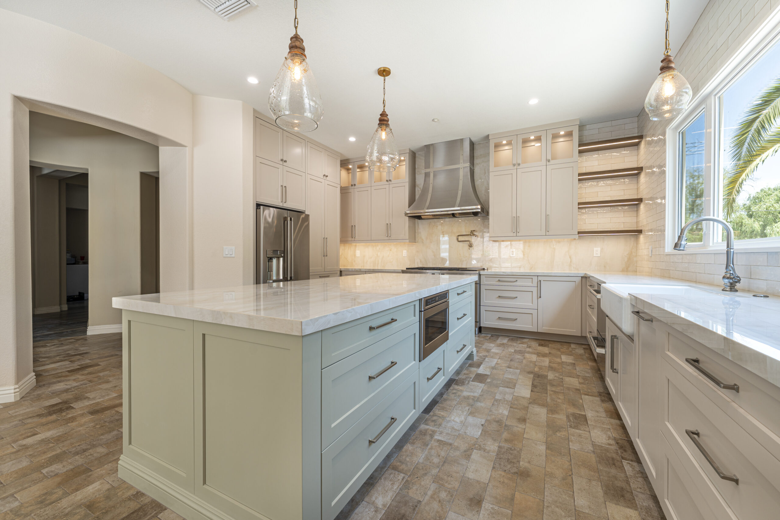 Light, bright kitchen remodel with oversized kitchen island for barstools.